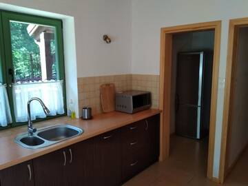 Фото номера Коттедж с 6 спальнями Дома для отпуска Dom w Szkotowie г. Янушково 77